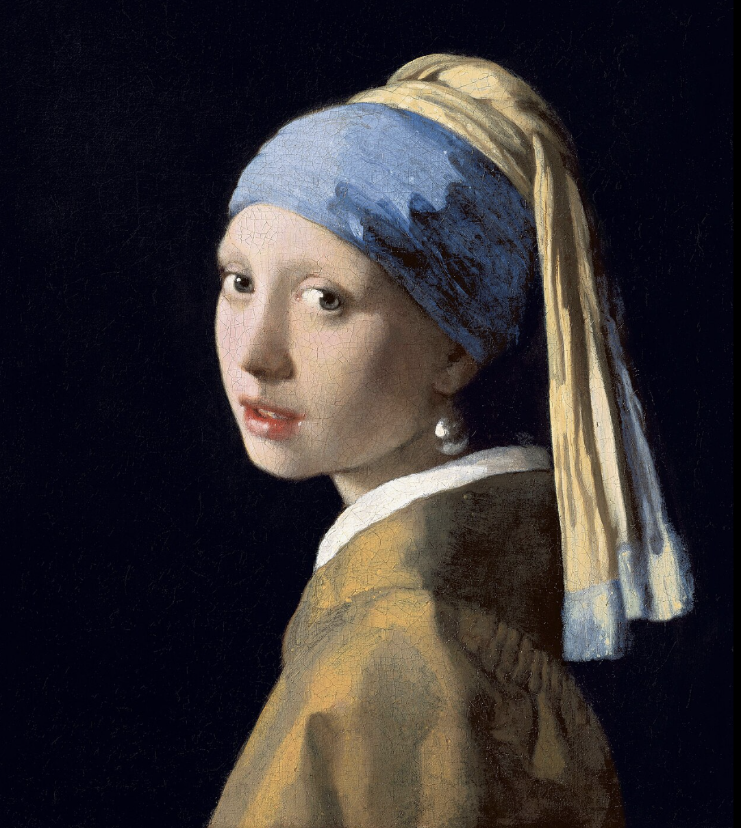 🎨 La joven de la perla – El susurro eterno de una mirada detenida en el tiempo